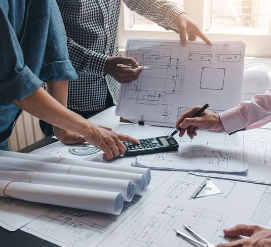 architect and engineer designing water leak detection systems